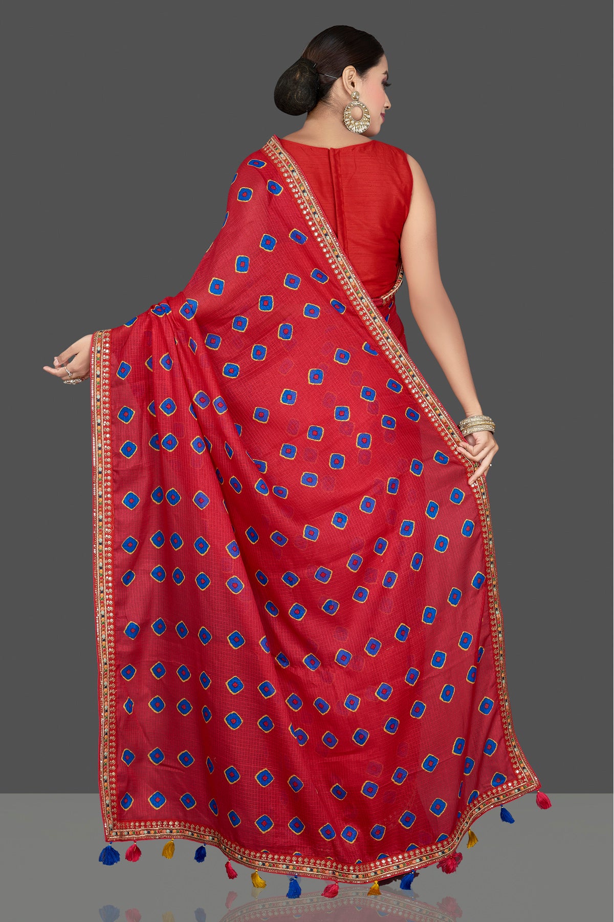Shop stunning red Kota silk saree online in USA with lace border. Be the center of attraction on special occasion in beautiful designer sarees, handloom saris, Kota silk sarees, Banarasi saris, Kanchipuram silk saris from Pure Elegance Indian saree store in USA.-back