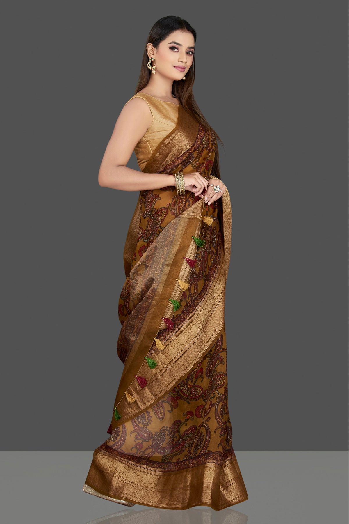 Shop beautiful mustard striped Kora organza saree online in USA with Kanchi border. Be the center of attraction on special occasion in beautiful designer sarees, handloom saris, Kota silk sarees, Banarasi saris, Kanchipuram silk saris from Pure Elegance Indian saree store in USA.-side