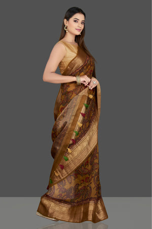 Shop beautiful mustard striped Kora organza saree online in USA with Kanchi border. Be the center of attraction on special occasion in beautiful designer sarees, handloom saris, Kota silk sarees, Banarasi saris, Kanchipuram silk saris from Pure Elegance Indian saree store in USA.-side
