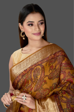 Shop beautiful mustard striped Kora organza saree online in USA with Kanchi border. Be the center of attraction on special occasion in beautiful designer sarees, handloom saris, Kota silk sarees, Banarasi saris, Kanchipuram silk saris from Pure Elegance Indian saree store in USA.-closeup