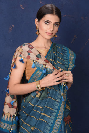 Shop beautiful blue Kalamkari print saree online in USA. Enrich your ethnic wardrobe with traditional Indian sarees, designer sarees. embroidered sarees, pure silk sarees, handwoven sarees, Kanchipuram saris, Banarasi sarees from Pure Elegance Indian saree store in USA.-closeup