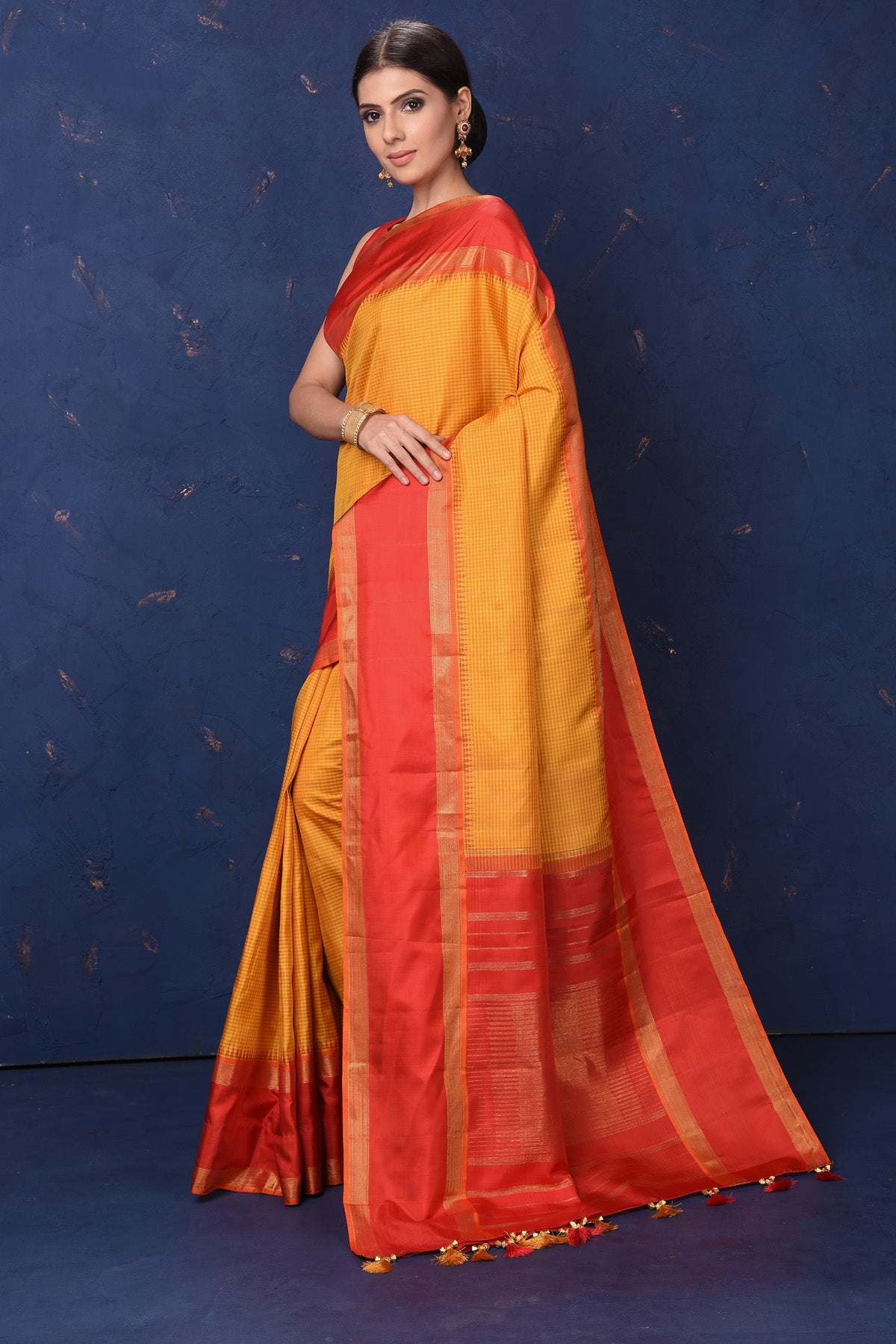 Buy stunning orange Kanjivaram saree online in USA with red zari border and pallu. Enrich your ethnic wardrobe with traditional Indian sarees, designer sarees. embroidered sarees, pure silk sarees, handwoven sarees, Kanchipuram saris, Banarasi sarees from Pure Elegance Indian saree store in USA.-pallu