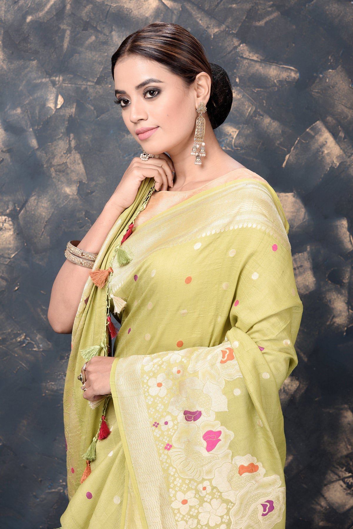 Buy gorgeous pista green georgette tussar silk saree online in USA with zari border. Keep your ethnic wardrobe updated with an exclusive range of designer sarees, pure silk sarees, handloom sarees, embroidered sarees, printed sarees, fancy sari from Pure Elegance Indian fashion store in USA.-closeup
