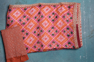 Shop gorgeous orange Kota Patola print sari online in USA with embroidery. Enrich your ethnic wardrobe with traditional Indian sarees, designer sarees. embroidered sarees, pure silk sarees, handwoven sarees, Kanchipuram saris, Banarasi sarees from Pure Elegance Indian saree store in USA.-blouse