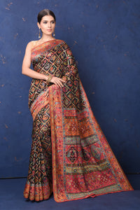 Shop gorgeous black weave saree online in USA with multicolor pallu. Buy latest designer sarees, handloom saris, embroidered sarees, Bollywood sarees, fancy sarees for special occasions from Pure Elegance Indian fashion store in USA. Shop soft silk sarees, pure Banarasi sarees, cotton sarees, georgette sarees. -full view