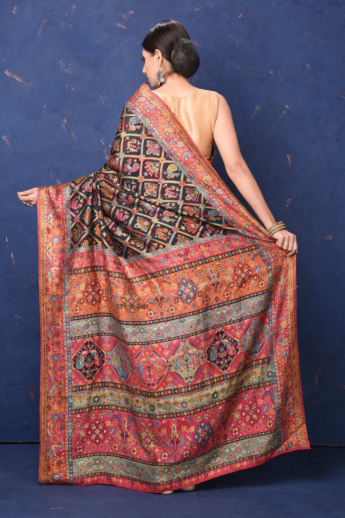 Shop gorgeous black weave saree online in USA with multicolor pallu. Buy latest designer sarees, handloom saris, embroidered sarees, Bollywood sarees, fancy sarees for special occasions from Pure Elegance Indian fashion store in USA. Shop soft silk sarees, pure Banarasi sarees, cotton sarees, georgette sarees. -back