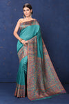 Shop stunning blue tussar muga silk sari online in USA with Kani border. Buy latest designer sarees, handloom saris, embroidered sarees, Bollywood sarees, fancy sarees for special occasions from Pure Elegance Indian fashion store in USA. Shop soft silk sarees, pure Banarasi sarees, cotton sarees, georgette sarees. -full view