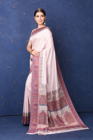 Buy stunning cream tussar muga silk saree online in USA with Kani border. Buy latest designer sarees, handloom saris, embroidered sarees, Bollywood sarees, fancy sarees for special occasions from Pure Elegance Indian fashion store in USA. Shop soft silk sarees, pure Banarasi sarees, cotton sarees, georgette sarees. -pallu