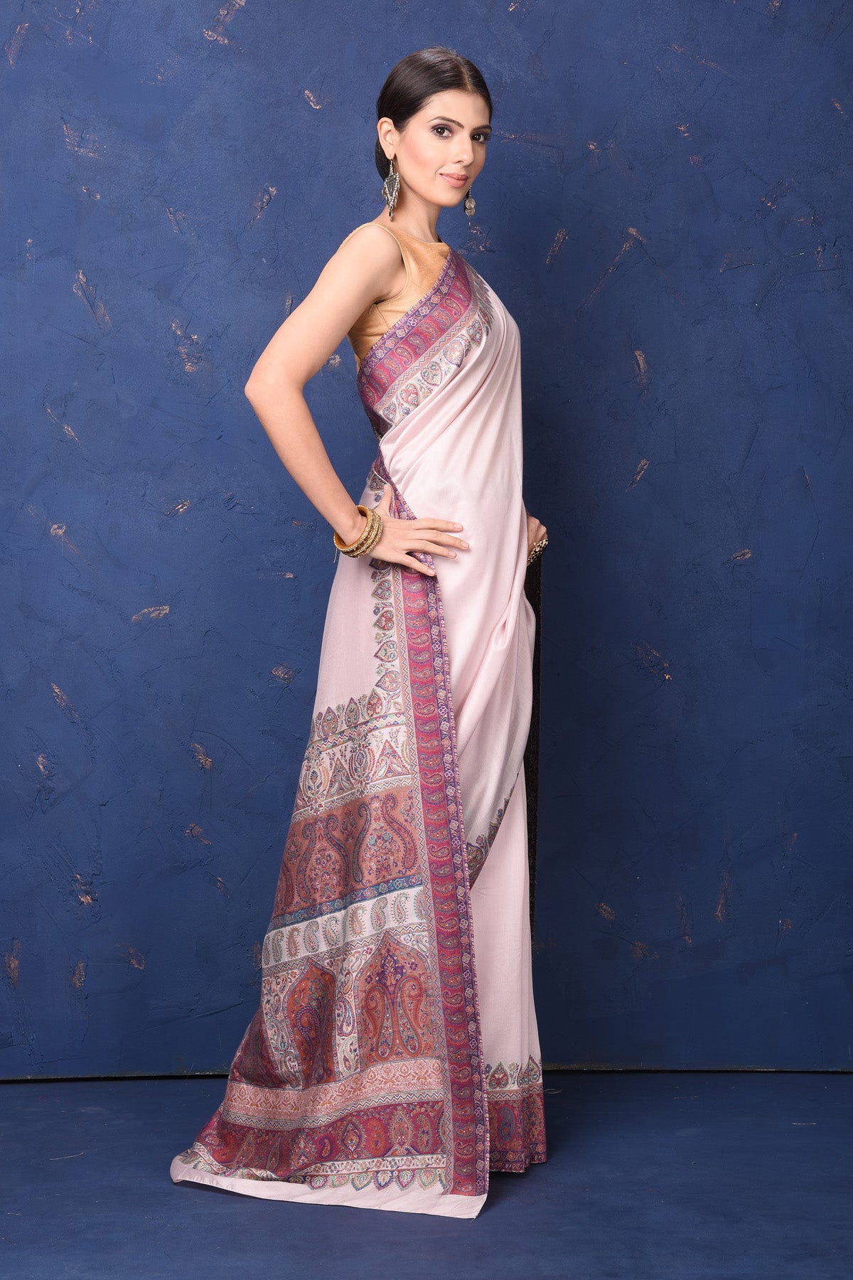 Buy stunning cream tussar muga silk saree online in USA with Kani border. Buy latest designer sarees, handloom saris, embroidered sarees, Bollywood sarees, fancy sarees for special occasions from Pure Elegance Indian fashion store in USA. Shop soft silk sarees, pure Banarasi sarees, cotton sarees, georgette sarees. -side