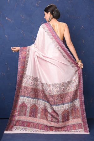 Buy stunning cream tussar muga silk saree online in USA with Kani border. Buy latest designer sarees, handloom saris, embroidered sarees, Bollywood sarees, fancy sarees for special occasions from Pure Elegance Indian fashion store in USA. Shop soft silk sarees, pure Banarasi sarees, cotton sarees, georgette sarees. -back