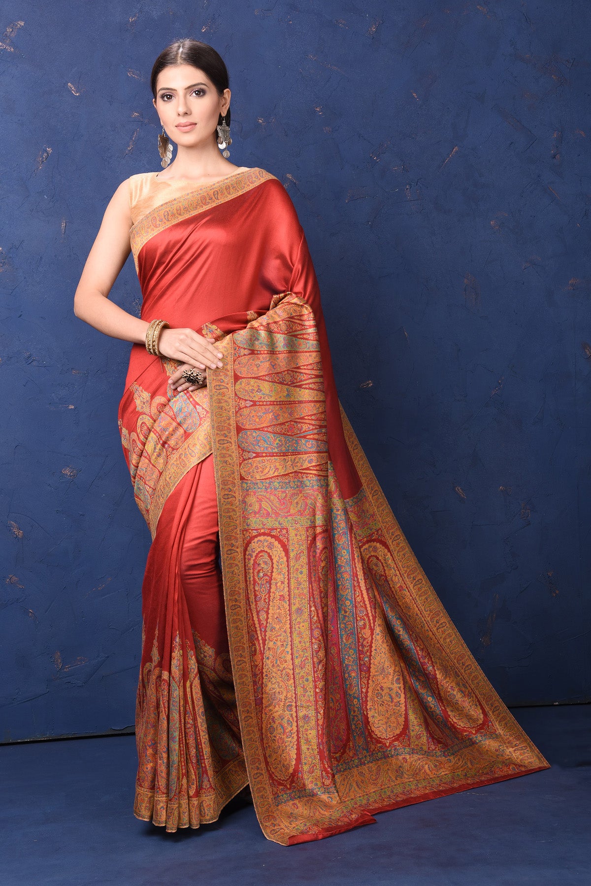Buy gorgeous red tussar muga silk saree online in USA with Kani border. Buy latest designer sarees, handloom saris, embroidered sarees, Bollywood sarees, fancy sarees for special occasions from Pure Elegance Indian fashion store in USA. Shop soft silk sarees, pure Banarasi sarees, cotton sarees, georgette sarees. -full view