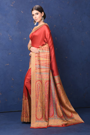 Buy gorgeous red tussar muga silk saree online in USA with Kani border. Buy latest designer sarees, handloom saris, embroidered sarees, Bollywood sarees, fancy sarees for special occasions from Pure Elegance Indian fashion store in USA. Shop soft silk sarees, pure Banarasi sarees, cotton sarees, georgette sarees. -pallu