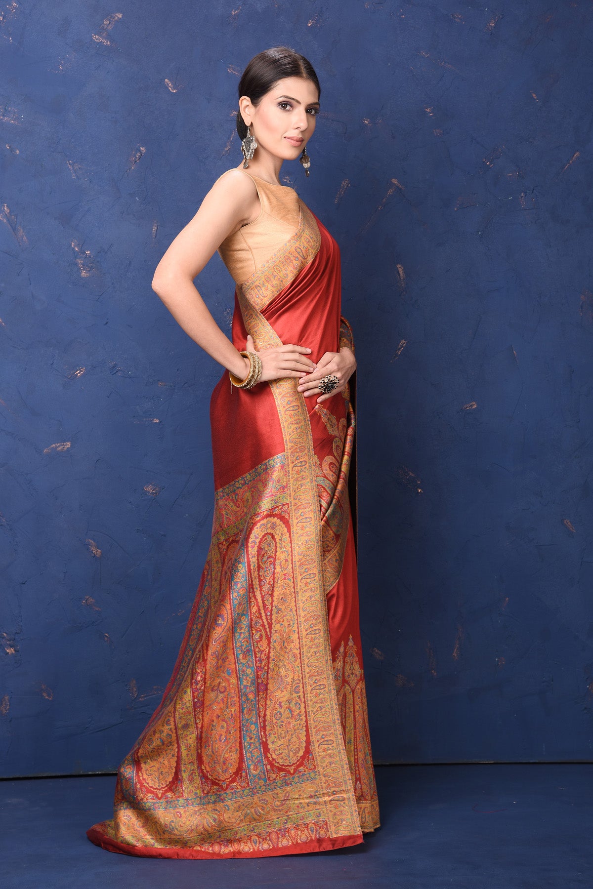 Buy gorgeous red tussar muga silk saree online in USA with Kani border. Buy latest designer sarees, handloom saris, embroidered sarees, Bollywood sarees, fancy sarees for special occasions from Pure Elegance Indian fashion store in USA. Shop soft silk sarees, pure Banarasi sarees, cotton sarees, georgette sarees. -side