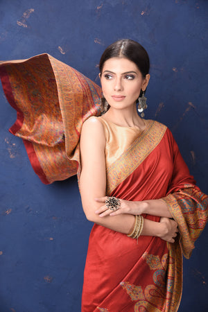 Buy gorgeous red tussar muga silk saree online in USA with Kani border. Buy latest designer sarees, handloom saris, embroidered sarees, Bollywood sarees, fancy sarees for special occasions from Pure Elegance Indian fashion store in USA. Shop soft silk sarees, pure Banarasi sarees, cotton sarees, georgette sarees. -closeup