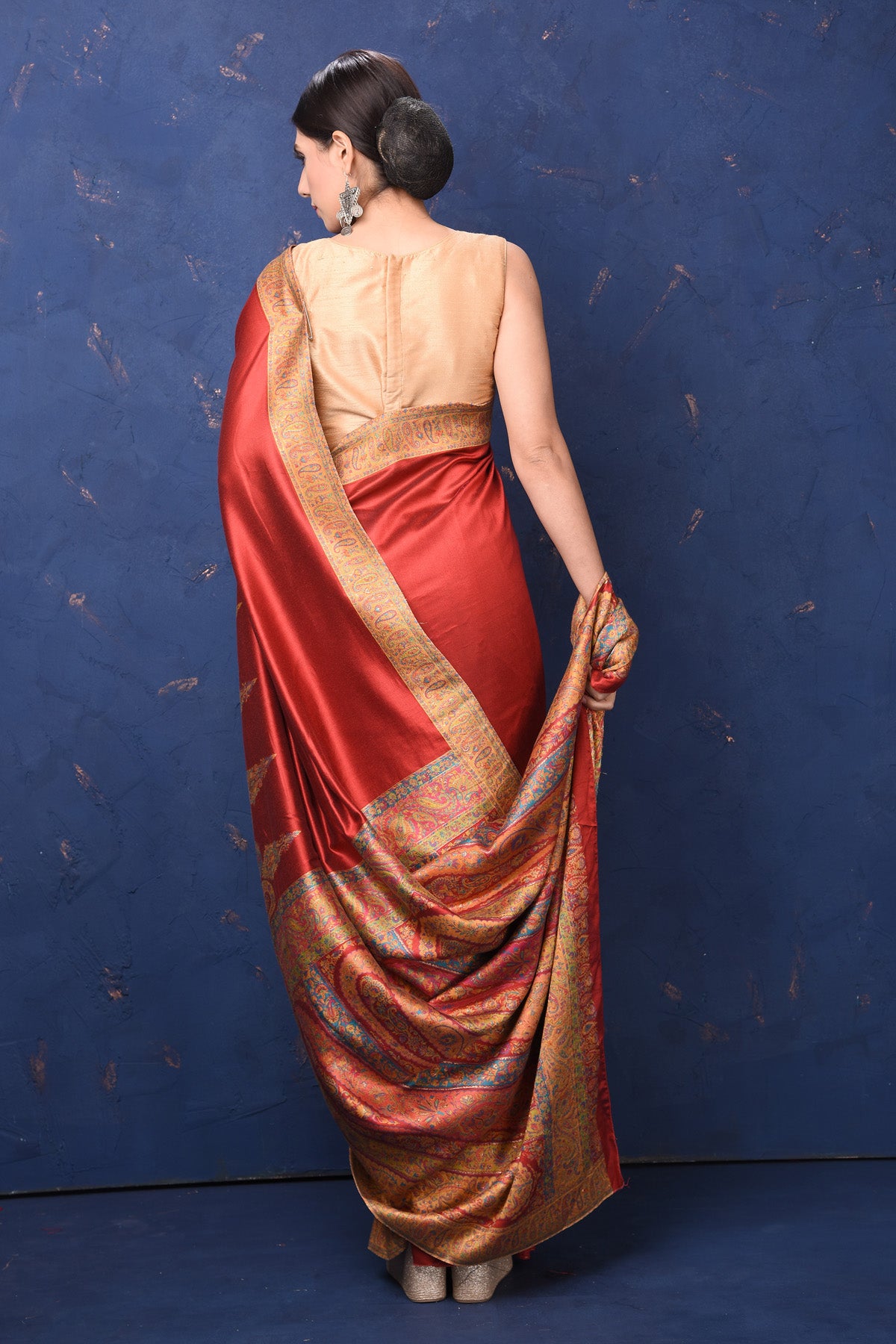 Buy gorgeous red tussar muga silk saree online in USA with Kani border. Buy latest designer sarees, handloom saris, embroidered sarees, Bollywood sarees, fancy sarees for special occasions from Pure Elegance Indian fashion store in USA. Shop soft silk sarees, pure Banarasi sarees, cotton sarees, georgette sarees. -back