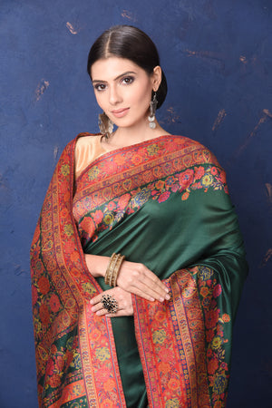 Shop gorgeous red tussar muga silk sari online in USA with Kani border. Buy latest designer sarees, handloom saris, embroidered sarees, Bollywood sarees, fancy sarees for special occasions from Pure Elegance Indian fashion store in USA. Shop soft silk sarees, pure Banarasi sarees, cotton sarees, georgette sarees.-closeup