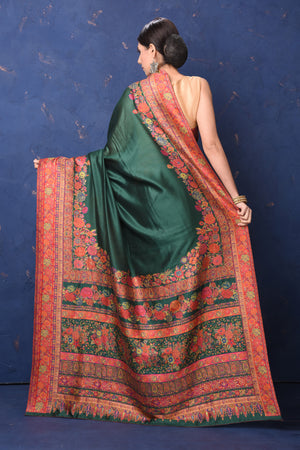 Shop gorgeous red tussar muga silk sari online in USA with Kani border. Buy latest designer sarees, handloom saris, embroidered sarees, Bollywood sarees, fancy sarees for special occasions from Pure Elegance Indian fashion store in USA. Shop soft silk sarees, pure Banarasi sarees, cotton sarees, georgette sarees.-back
