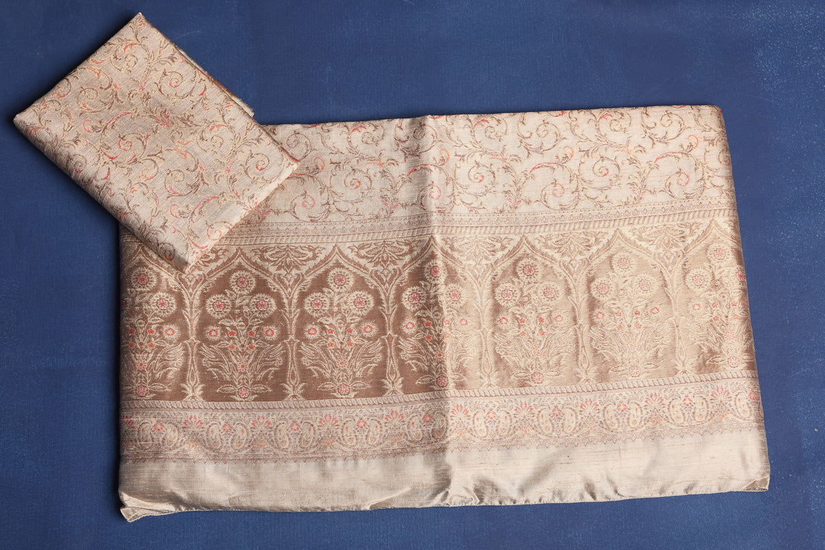 Shop beautiful cream handspun silk sari online in USA. Buy latest designer sarees, handloom saris, embroidered sarees, Bollywood sarees, fancy sarees for special occasions from Pure Elegance Indian fashion store in USA. Shop soft silk sarees, pure Banarasi sarees, cotton sarees, georgette sarees.-blouse