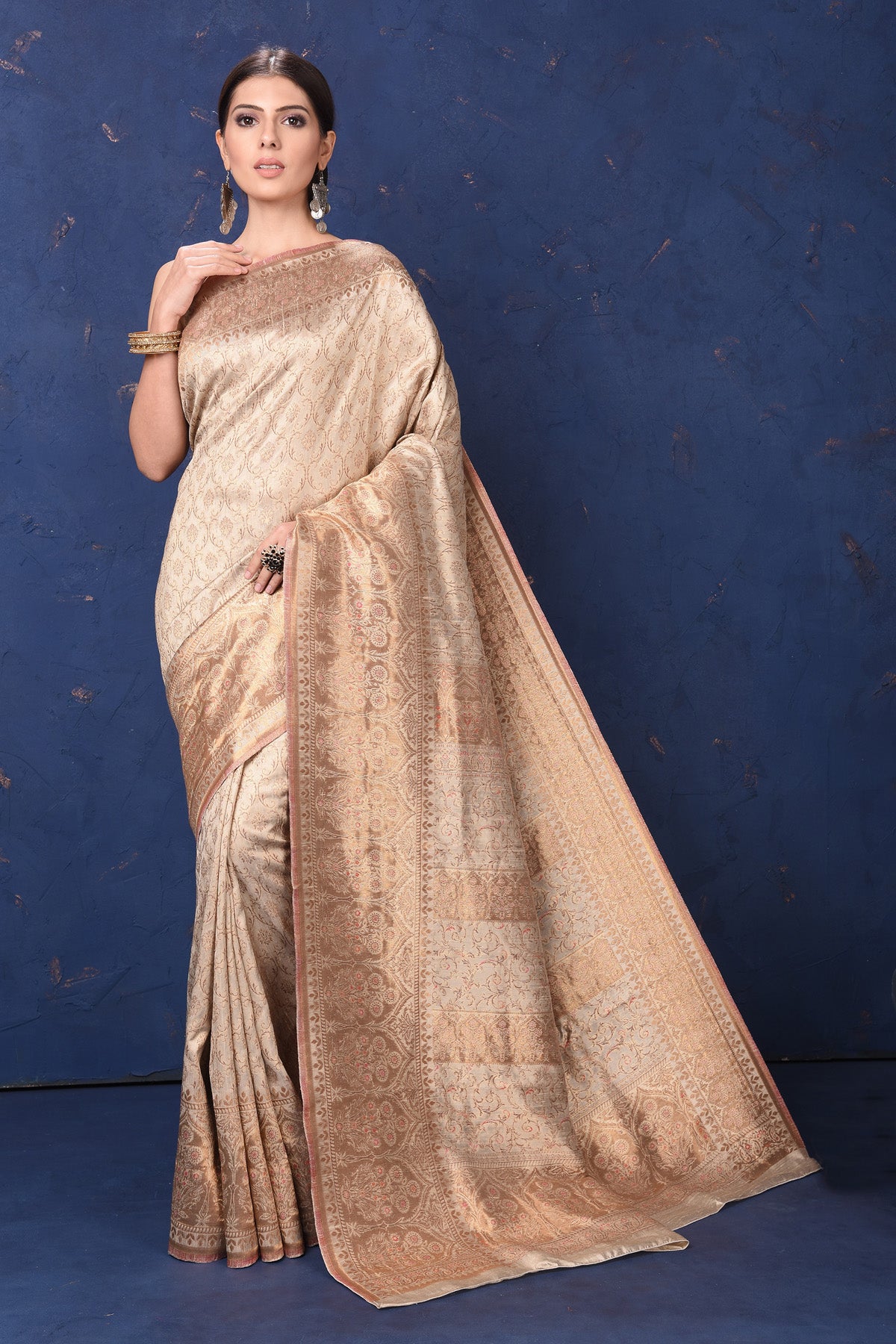 Shop beautiful cream handspun silk sari online in USA. Buy latest designer sarees, handloom saris, embroidered sarees, Bollywood sarees, fancy sarees for special occasions from Pure Elegance Indian fashion store in USA. Shop soft silk sarees, pure Banarasi sarees, cotton sarees, georgette sarees.-full view