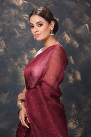 Shop beautiful maroon Bandhej organza sari online in USA. Enrich your ethnic wardrobe with traditional Indian sarees, designer sarees. embroidered sarees, pure silk sarees, handwoven sarees, Kanchipuram sarees, Banarasi saris from Pure Elegance Indian saree store in USA.-closeup