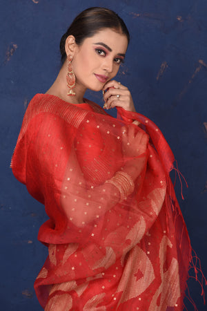 Shop stunning red embellished matka silk sari online in USA. Look elegant on festive occasions in exclusive silk sarees, matka sarees, handwoven sarees, embroidered sarees, designer sarees from Pure Elegance Indian saree store in USA.-closeup