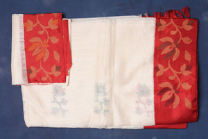 Shop gorgeous off-white matka silk sari online in USA with cut shuttle weave border. Look elegant on festive occasions in exclusive silk sarees, matka sarees, handwoven sarees, embroidered sarees, designer sarees from Pure Elegance Indian saree store in USA.-blouse