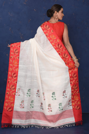 Shop gorgeous off-white matka silk sari online in USA with cut shuttle weave border. Look elegant on festive occasions in exclusive silk sarees, matka sarees, handwoven sarees, embroidered sarees, designer sarees from Pure Elegance Indian saree store in USA.-back