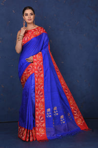 Shop beautiful bright blue matka silk saree online in USA with red cut shuttle weave border. Look elegant on festive occasions in exclusive silk sarees, matka sarees, handwoven sarees, embroidered sarees, designer sarees from Pure Elegance Indian saree store in USA.-full view