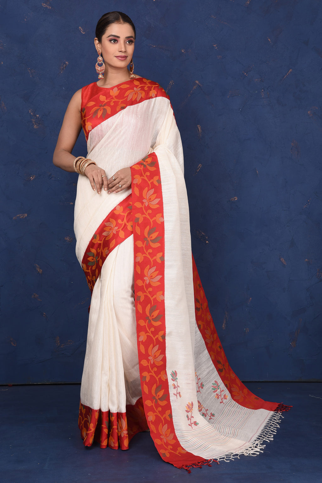 Buy beautiful off-white matka silk saree online in USA with red cut shuttle weave border. Look elegant on festive occasions in exclusive silk sarees, matka sarees, handwoven sarees, embroidered sarees, designer sarees from Pure Elegance Indian saree store in USA.-full view