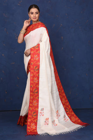Buy beautiful off-white matka silk saree online in USA with red cut shuttle weave border. Look elegant on festive occasions in exclusive silk sarees, matka sarees, handwoven sarees, embroidered sarees, designer sarees from Pure Elegance Indian saree store in USA.-pallu