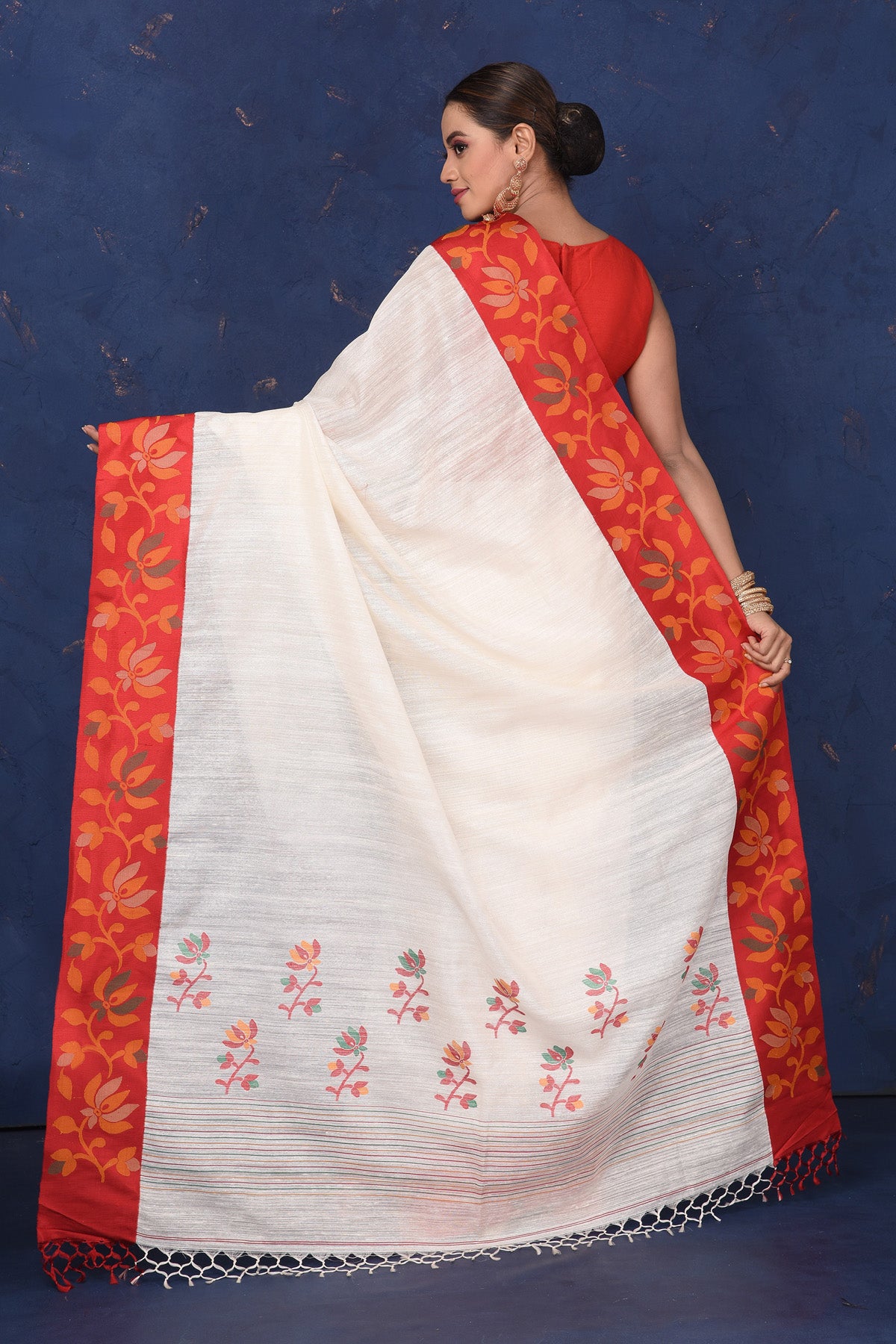 Buy beautiful off-white matka silk saree online in USA with red cut shuttle weave border. Look elegant on festive occasions in exclusive silk sarees, matka sarees, handwoven sarees, embroidered sarees, designer sarees from Pure Elegance Indian saree store in USA.-back