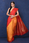 Buy beautiful orange Kanjivaram silk saree online in USA with red temple border. Flaunt your ethnic style at weddings and festive occasions in exquisite Indian sarees, Kanjeevaram sarees, handloom sarees, designer sarees, embroidered sarees from Pure Elegance Indian saree store in USA.-full view