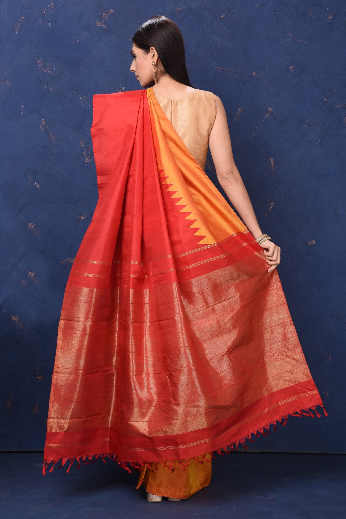 Buy beautiful orange Kanjivaram silk saree online in USA with red temple border. Flaunt your ethnic style at weddings and festive occasions in exquisite Indian sarees, Kanjeevaram sarees, handloom sarees, designer sarees, embroidered sarees from Pure Elegance Indian saree store in USA.-back