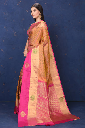 Buy beautiful mustard Kanjivaram silk sari online in USA with pink zari border. Flaunt your ethnic style at weddings and festive occasions in exquisite Indian sarees, Kanjeevaram sarees, handloom sarees, designer sarees, embroidered sarees from Pure Elegance Indian saree store in USA.-pallu