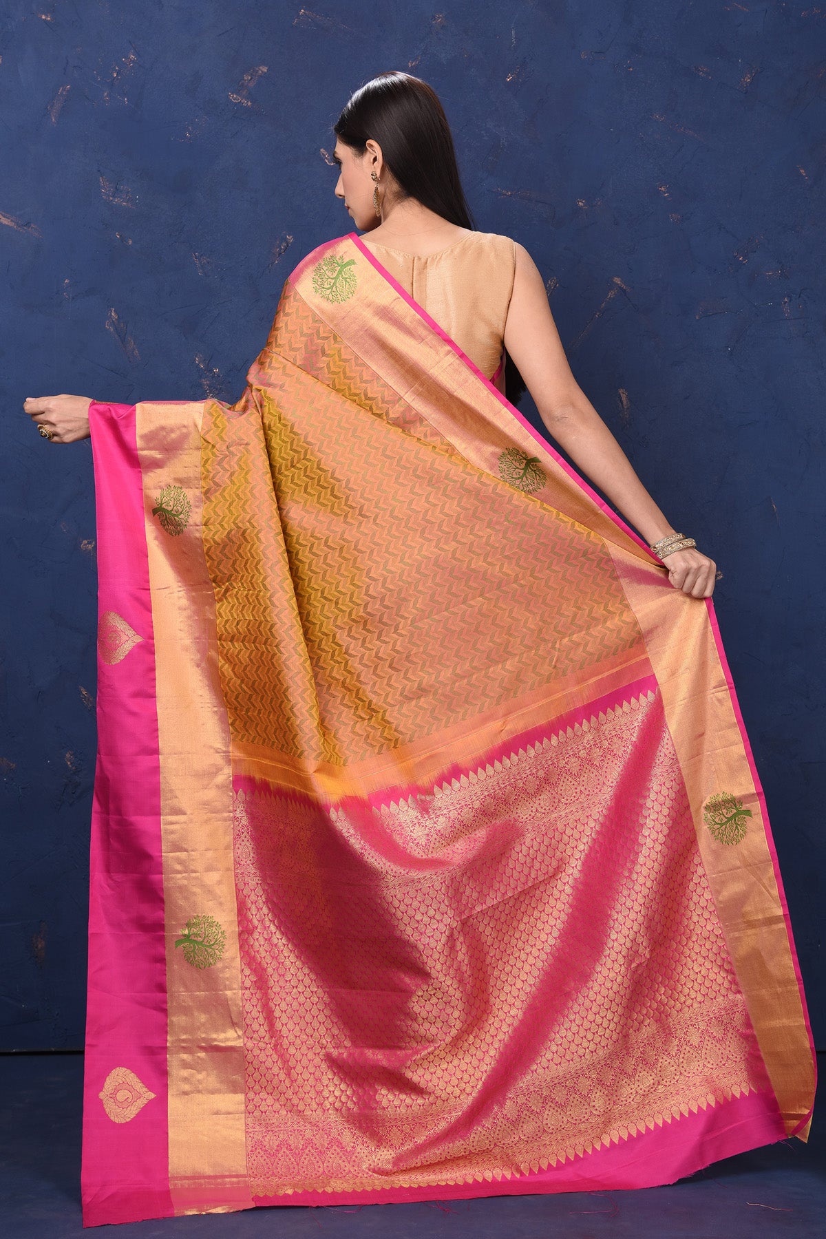 Buy beautiful mustard Kanjivaram silk sari online in USA with pink zari border. Flaunt your ethnic style at weddings and festive occasions in exquisite Indian sarees, Kanjeevaram sarees, handloom sarees, designer sarees, embroidered sarees from Pure Elegance Indian saree store in USA.-back