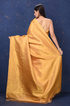 Buy stunning beige golden Kanjivaram silk sari online in USA. Flaunt your ethnic style at weddings and festive occasions in exquisite Indian sarees, Kanjeevaram sarees, handloom sarees, designer sarees, embroidered sarees from Pure Elegance Indian saree store in USA.-back