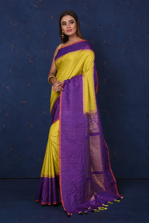 Buy stunning pista green Gadhwal silk saree online in USA with purple border and pallu. Set fashion goals on special occasions in exclusive silk sarees, Banarasi sarees, Kanjivaram sarees, handloom sarees, chiffon sarees, designer sarees from Pure Elegance Indian fashion store in USA.-pallu
