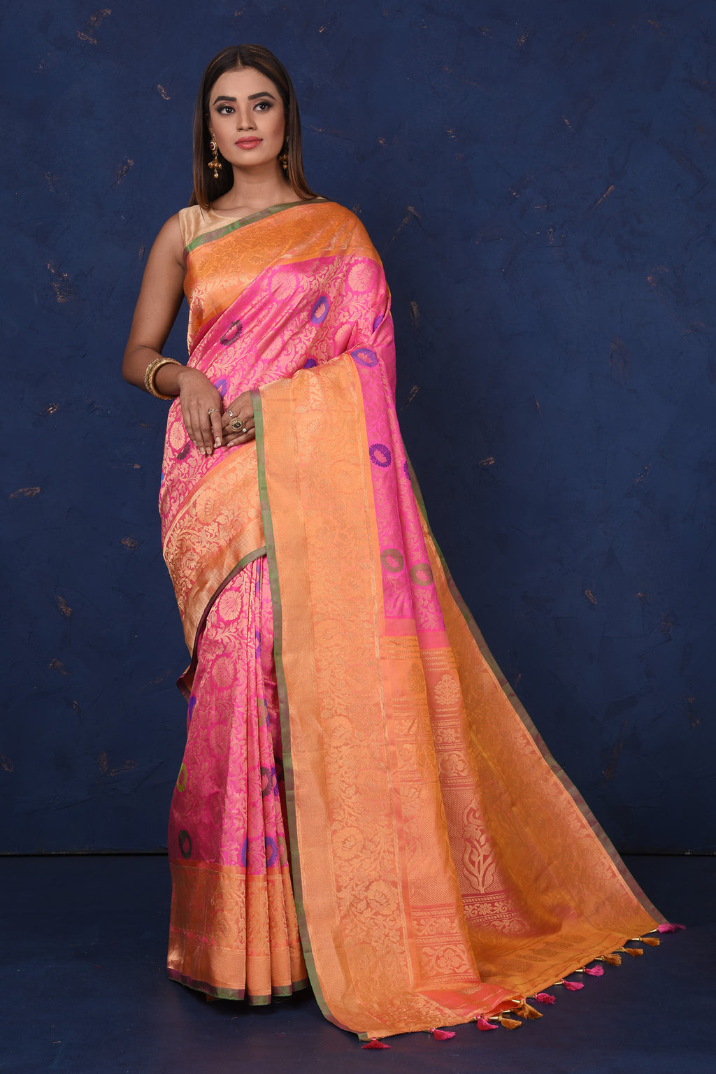 Shop stunning light pink Gadhwal silk Brocade sari online in USA with peach border. Set fashion goals on special occasions in exclusive silk sarees, Banarasi sarees, Kanjivaram sarees, handloom sarees, chiffon sarees, designer sarees from Pure Elegance Indian fashion store in USA.-full view