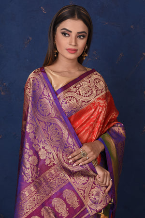Shop gorgeous red Gadhwal silk Brocade sari online in USA with purple border. Set fashion goals on special occasions in exclusive silk sarees, Banarasi sarees, Kanjivaram sarees, handloom sarees, chiffon sarees, designer sarees from Pure Elegance Indian fashion store in USA.-closeup