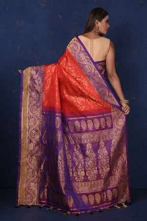 Shop gorgeous red Gadhwal silk Brocade sari online in USA with purple border. Set fashion goals on special occasions in exclusive silk sarees, Banarasi sarees, Kanjivaram sarees, handloom sarees, chiffon sarees, designer sarees from Pure Elegance Indian fashion store in USA.-back