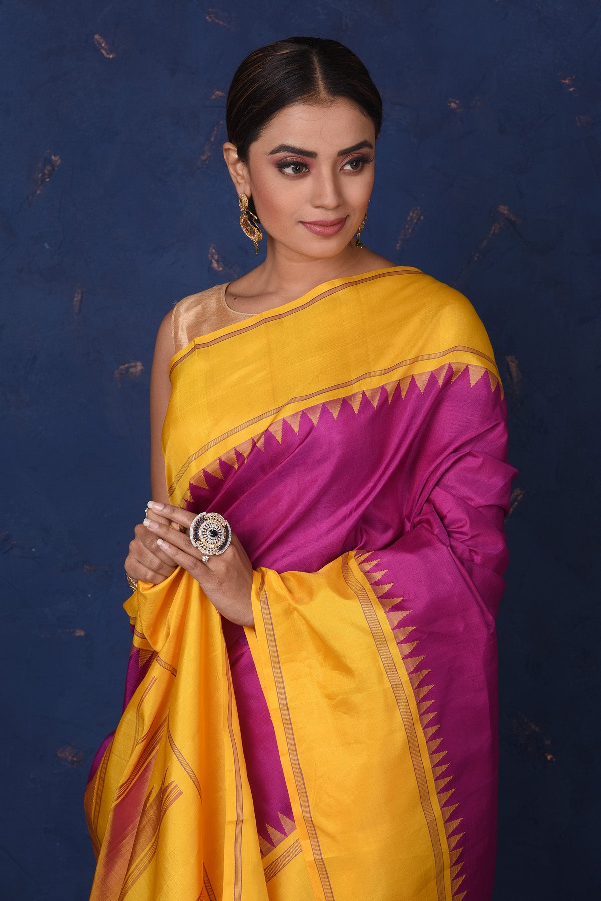 Shop beautiful purple Kanjeevaram silk saree online in USA with yellow border and pallu. Be the center of attraction on special occasions in stunning designer sarees, handloom sarees, Kanchipuram silk sarees, pure silk sarees from Pure Elegance Indian fashion store in USA.-closeup