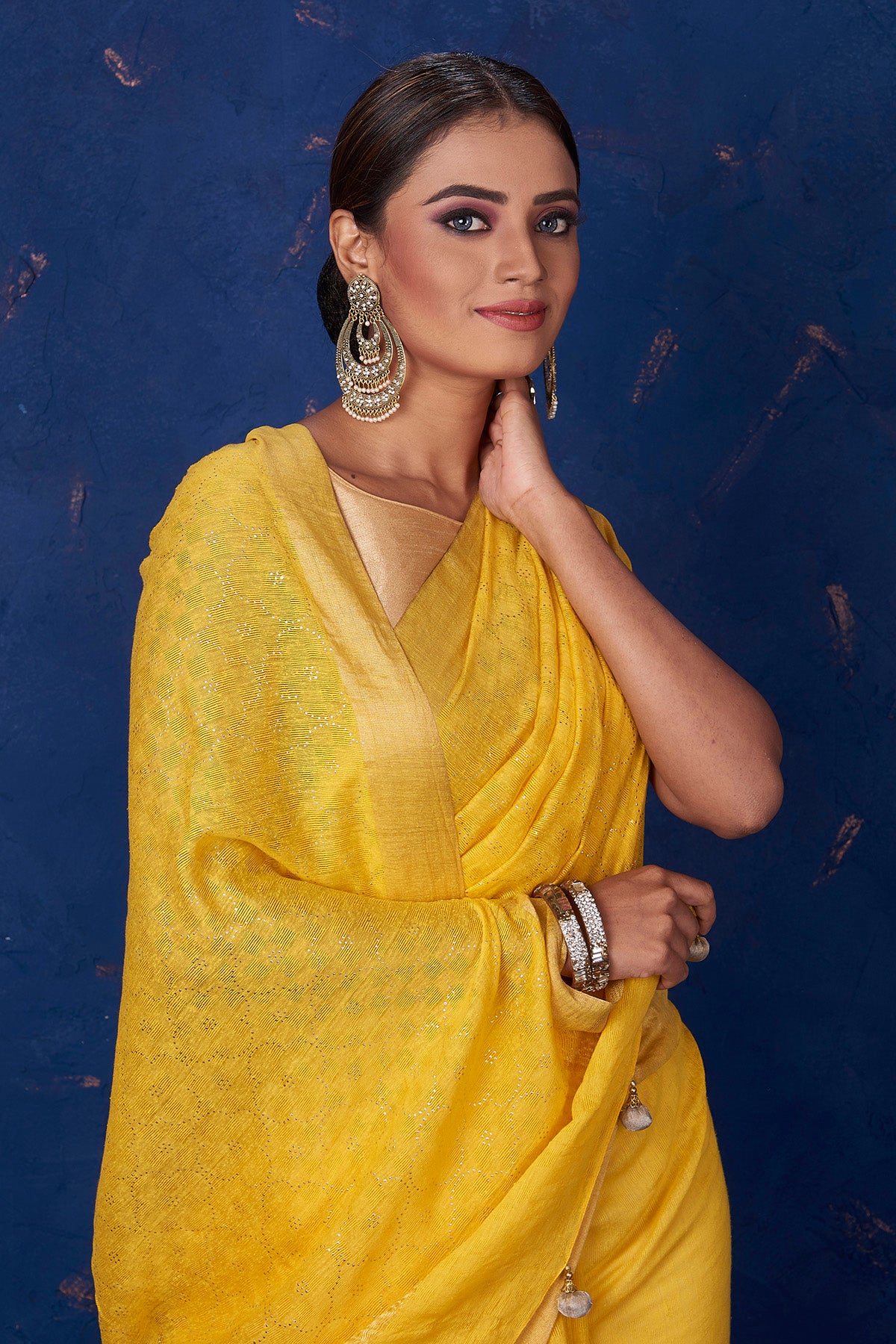 Buy stunning yellow badla work sari online in USA with golden border. Keep your ethnic wardrobe with exclusive designer sarees, handloom sarees, pure silk sarees, soft silk sarees, Banarasi silk sarees from Pure Elegance Indian fashion store in USA.-closeup