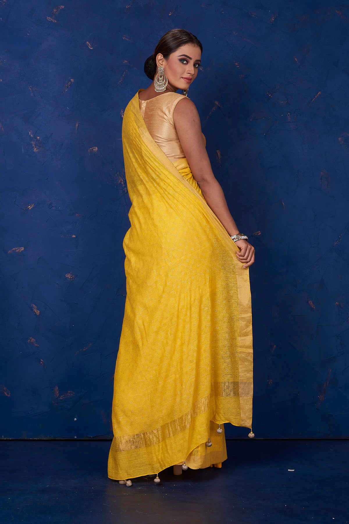 Buy stunning yellow badla work sari online in USA with golden border. Keep your ethnic wardrobe with exclusive designer sarees, handloom sarees, pure silk sarees, soft silk sarees, Banarasi silk sarees from Pure Elegance Indian fashion store in USA.-back