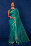 Buy stunning sea green badla work saree online in USA with golden border. Keep your ethnic wardrobe with exclusive designer sarees, handloom sarees, pure silk sarees, soft silk sarees, Banarasi silk sarees from Pure Elegance Indian fashion store in USA.-full view