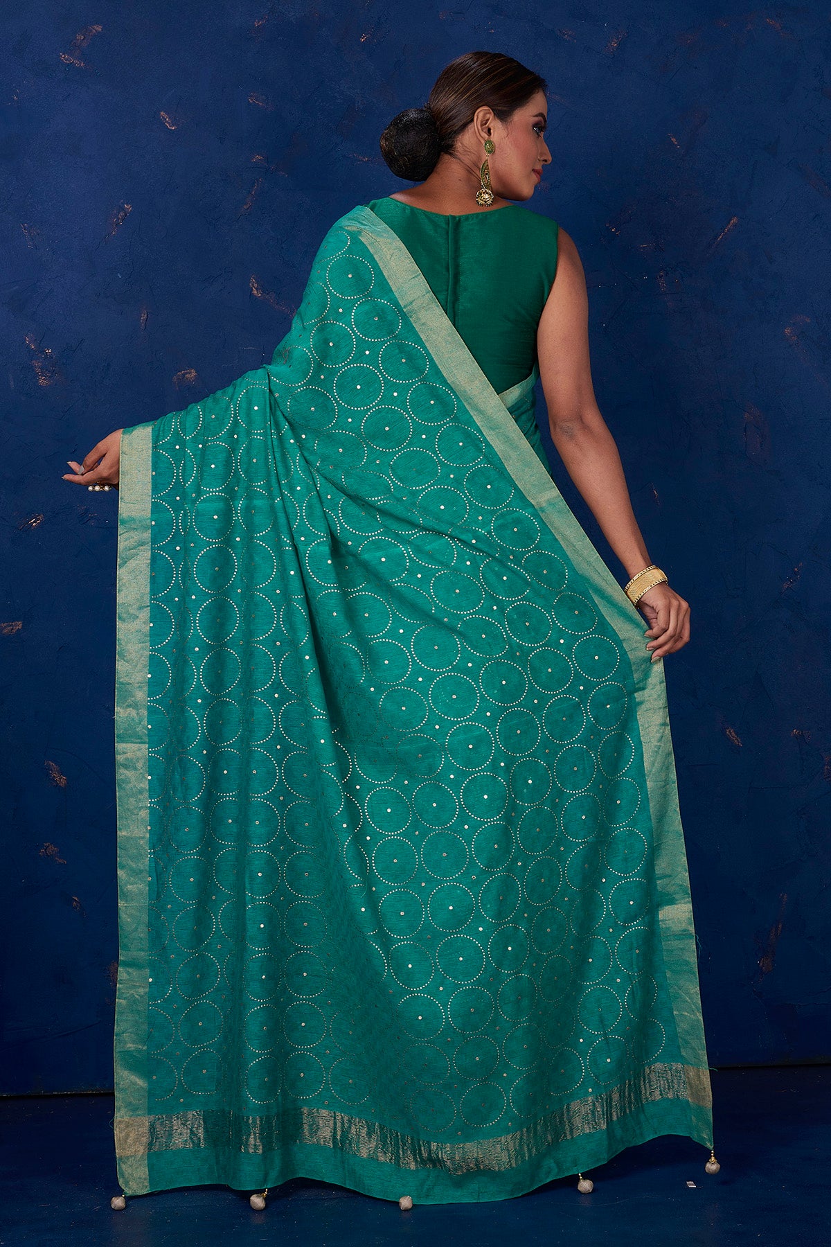 Buy stunning sea green badla work saree online in USA with golden border. Keep your ethnic wardrobe with exclusive designer sarees, handloom sarees, pure silk sarees, soft silk sarees, Banarasi silk sarees from Pure Elegance Indian fashion store in USA.-back
