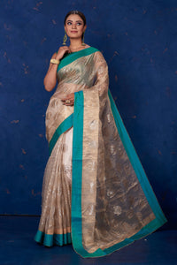 Shop stunning beige foil print organza saree online in USA with green border. Keep your ethnic wardrobe with exclusive designer sarees, handloom sarees, pure silk sarees, soft silk sarees, Banarasi silk sarees from Pure Elegance Indian fashion store in USA.-full view