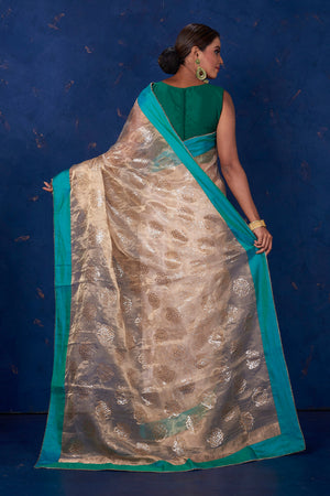 Shop stunning beige foil print organza saree online in USA with green border. Keep your ethnic wardrobe with exclusive designer sarees, handloom sarees, pure silk sarees, soft silk sarees, Banarasi silk sarees from Pure Elegance Indian fashion store in USA.-back