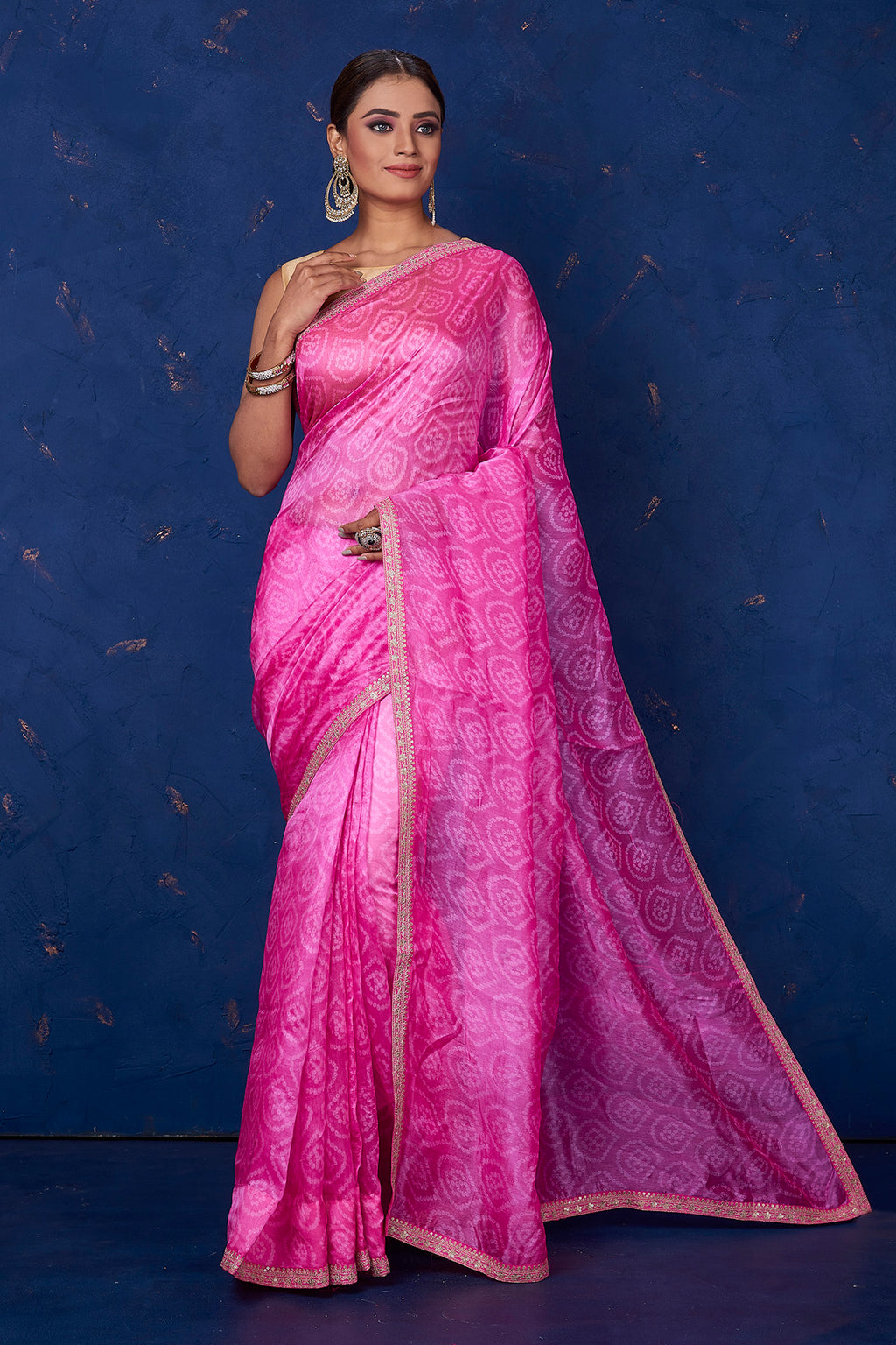 Shop gorgeous light pink embroidered Bandhej organza saree online in USA. Keep your ethnic wardrobe with exclusive designer sarees, handloom sarees, pure silk sarees, soft silk sarees, Banarasi silk sarees from Pure Elegance Indian fashion store in USA.-full view
