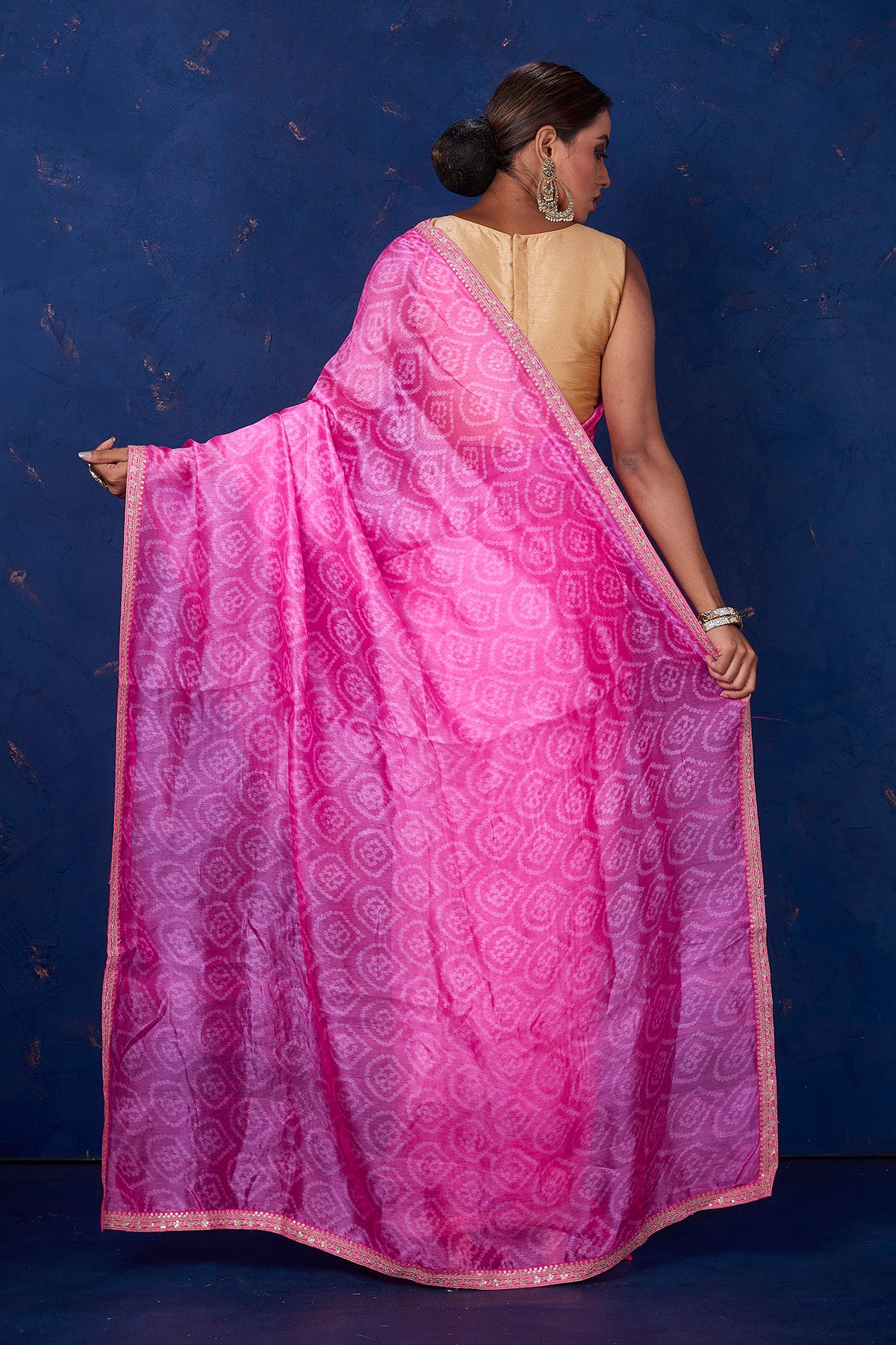 Shop gorgeous light pink embroidered Bandhej organza saree online in USA. Keep your ethnic wardrobe with exclusive designer sarees, handloom sarees, pure silk sarees, soft silk sarees, Banarasi silk sarees from Pure Elegance Indian fashion store in USA.-back