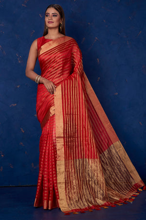 Buy stunning red striped tussar sari online in USA with golden zari border. Keep your ethnic wardrobe up to date with latest designer sarees, pure silk sarees, handwoven sarees, tussar silk sarees, embroidered sarees from Pure Elegance Indian saree store in USA.-front